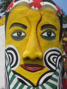 Visitors are greeted by another of Pasaquan's enormous outdoor faces